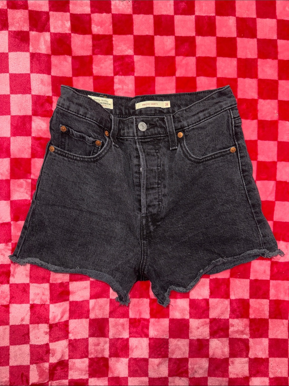 Levi's Washed Black High-Rise Ribcage Cutoff Denim Shorts